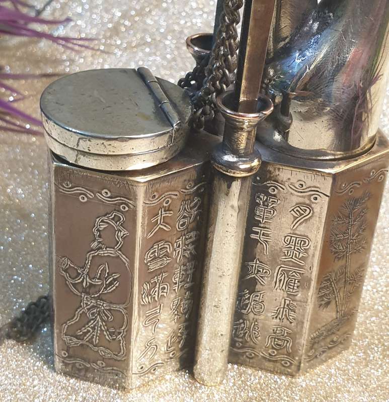 A Chinese white metal opium pipe