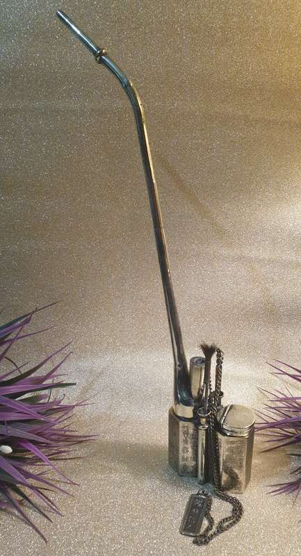 A Chinese white metal opium pipe