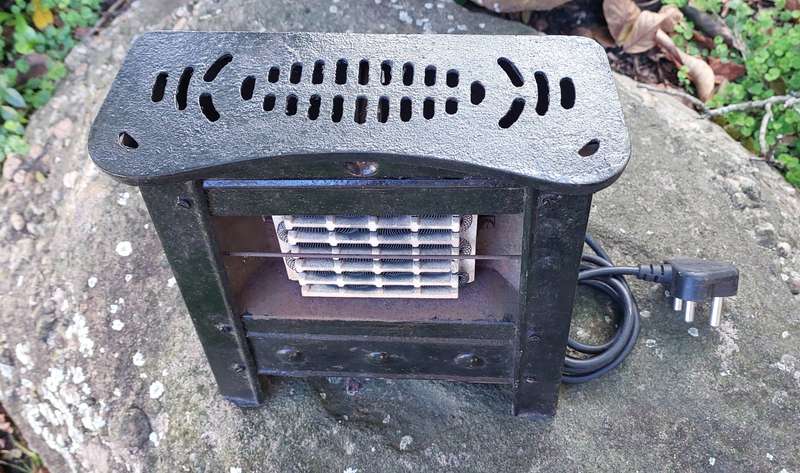 Stunning small steel and cast iron heater from the early 50's . Working