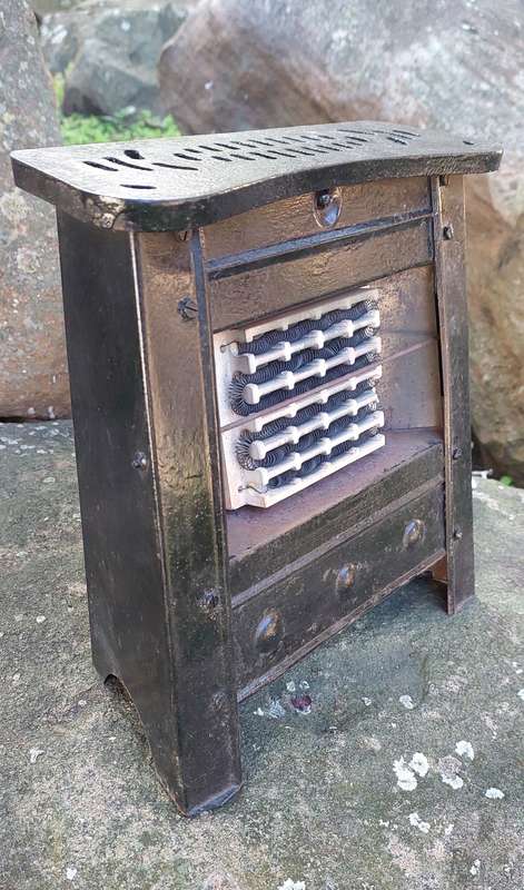 Stunning small steel and cast iron heater from the early 50's . Working