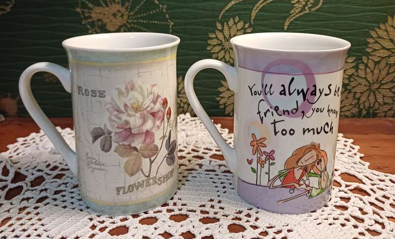 TWO COFFEE CUPS