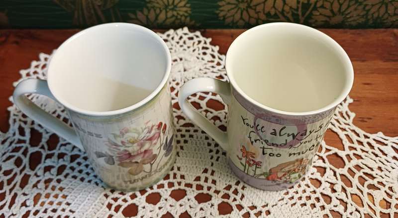 TWO COFFEE CUPS