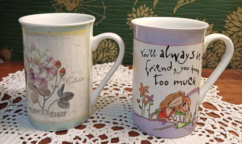 TWO COFFEE CUPS