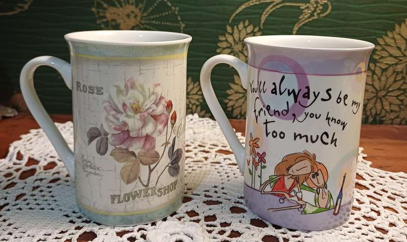 TWO COFFEE CUPS