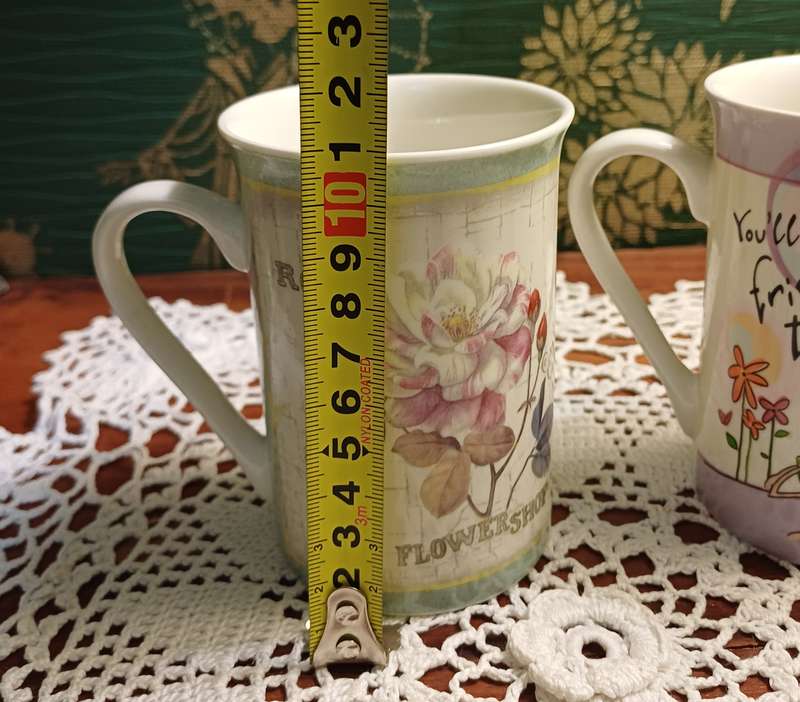 TWO COFFEE CUPS
