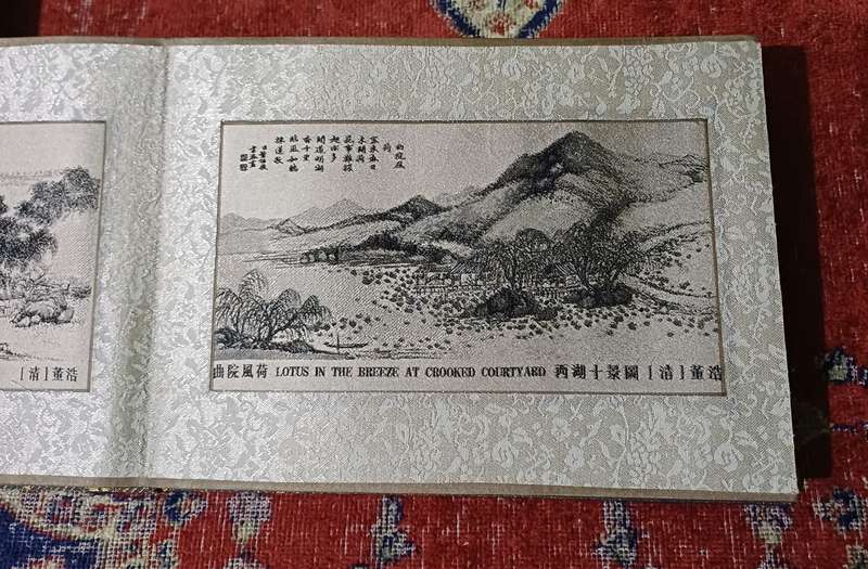 Chinese accordion book with  silk panels |