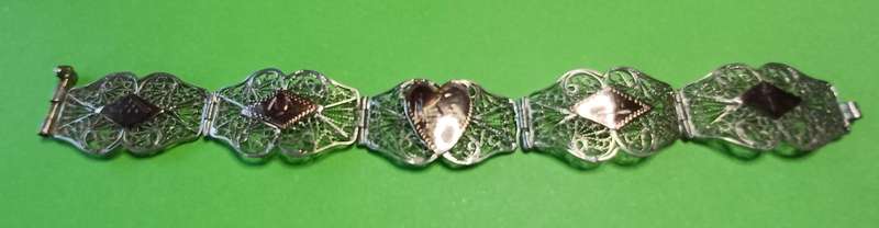 Vintage silver filigree and copper link bracelet  | 33 |