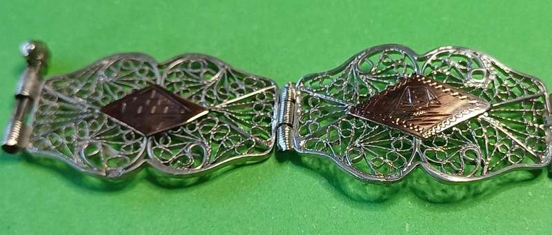 Vintage silver filigree and copper link bracelet  | 33 |