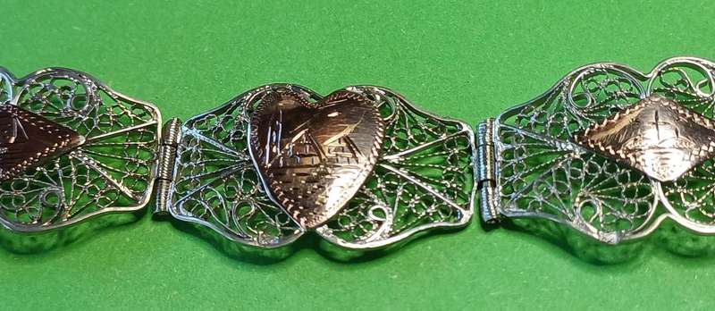 Vintage silver filigree and copper link bracelet  | 33 |