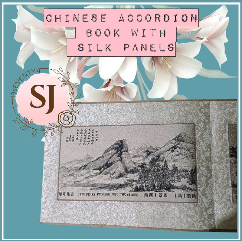 Chinese accordion book with  silk panels |
