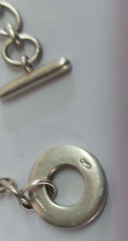 Wow!! Links of London hallmarked silver charm bracelet 15.4g value R2500