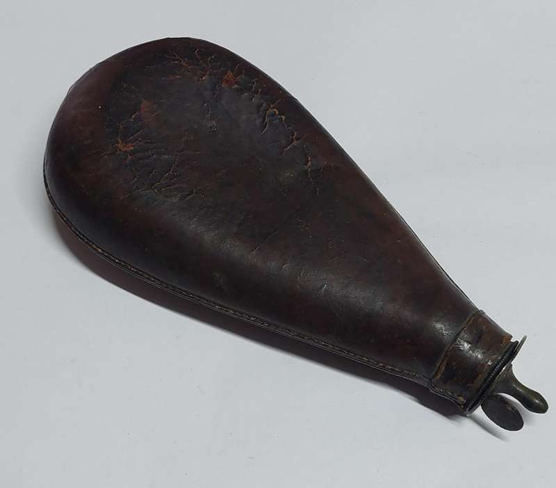 Rare!! 19th century leather & brass bird shot flask with bird shot inside circa 1850's Value R2500