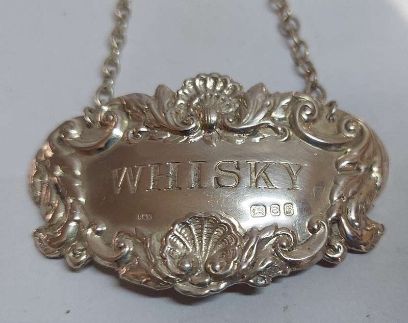 Exquisite 1976 london silver Whiskey decater label 10.3g