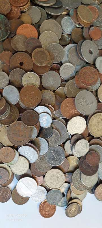 6.3kg of SA & international coins