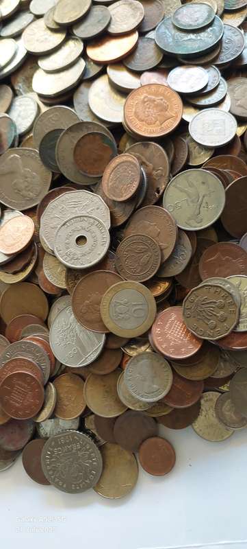 6.3kg of SA & international coins