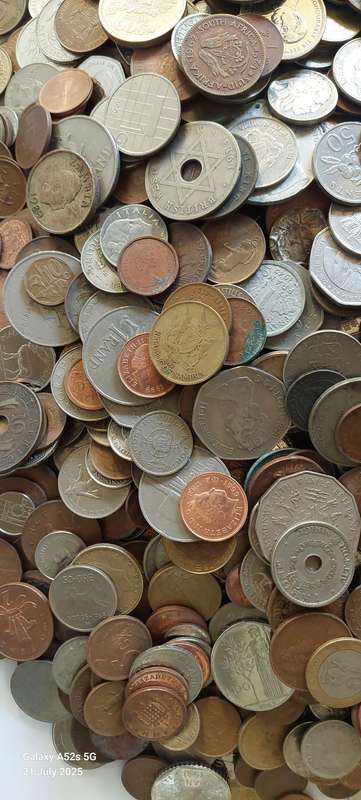 6.3kg of SA & international coins