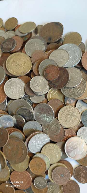 6.3kg of SA & international coins