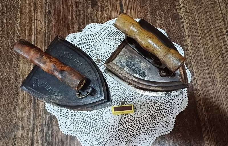 Pair of large antique Special number 10. Tested Coal Irons, latched with wooden handles