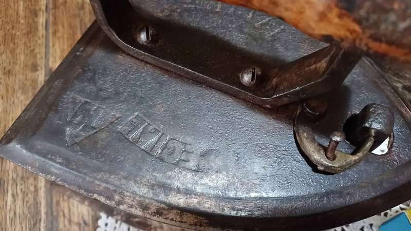 Pair of large antique Special number 10. Tested Coal Irons, latched with wooden handles
