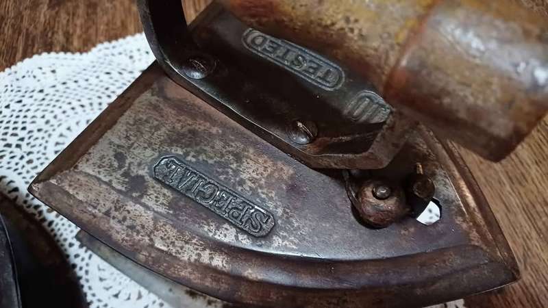 Pair of large antique Special number 10. Tested Coal Irons, latched with wooden handles