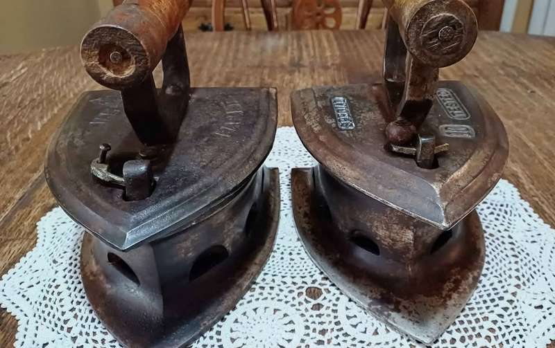 Pair of large antique Special number 10. Tested Coal Irons, latched with wooden handles