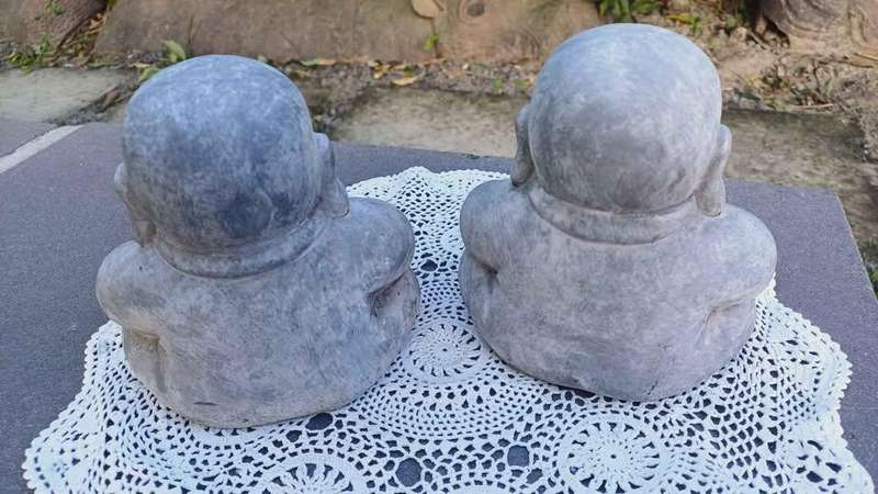 Set of 2 small concrete meditating Buddhas