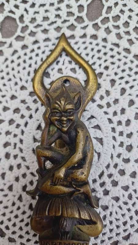 Vintage brass door knocker. Cheeky Dartmoor Pixie sitting on a toadstool