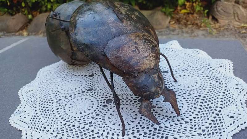 Rolling along.Scarab/Dung Beetle metal tin art (with attachment!!)