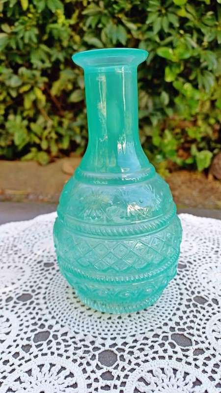Vintage green glass bud vase with moulded geometric pattern