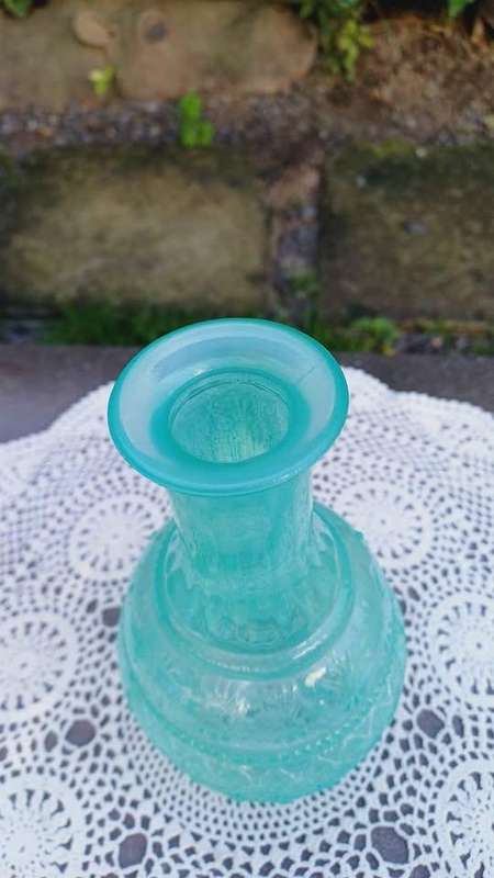 Vintage green glass bud vase with moulded geometric pattern