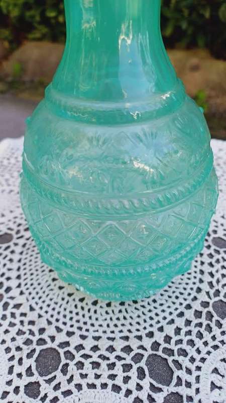 Vintage green glass bud vase with moulded geometric pattern