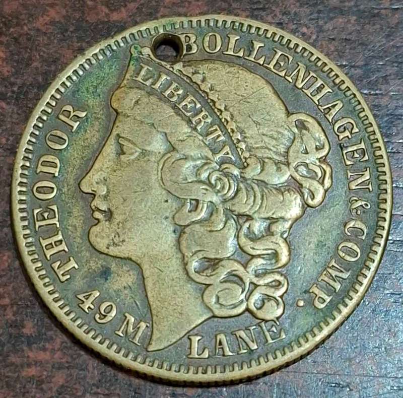 vintage game counter token from the 1850s, featuring New York City Hall