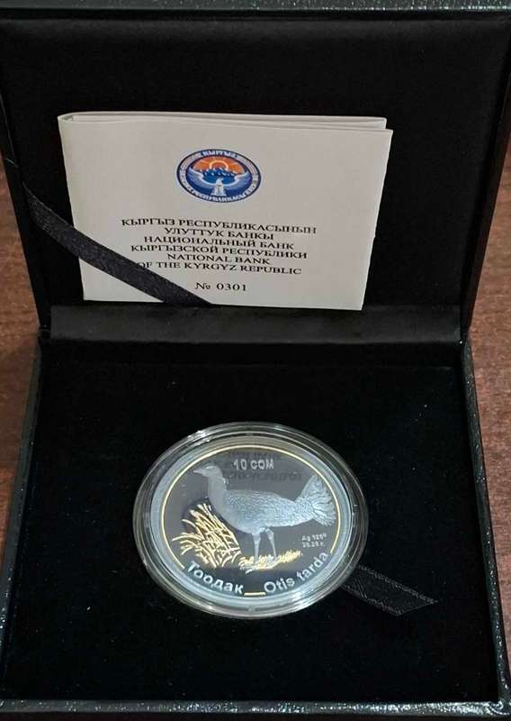 2015 10 Som coin from Kyrgyzstan The coin is made of silver with a gold ring