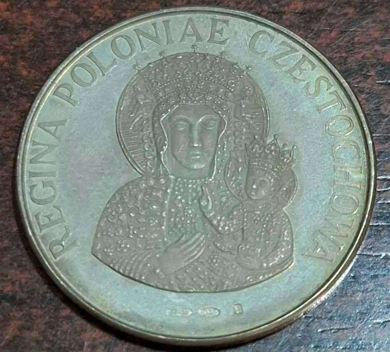 commemorative medal or token featuring Pope John Paul II