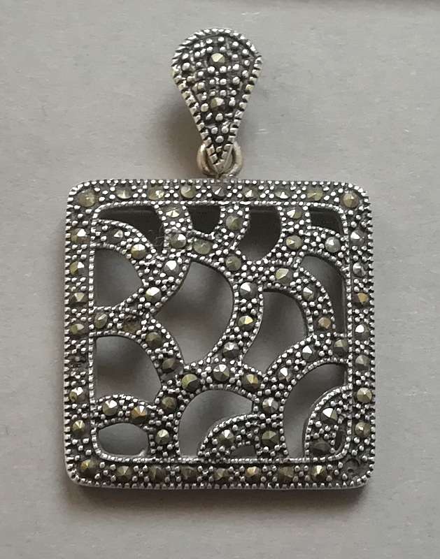 STERLING SILVER  AND MARCASITE PENDANT 22 X 40MM 9.2 GRAMS