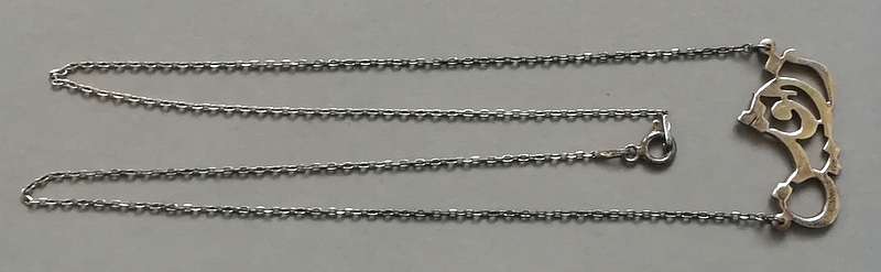 STERLING SILVER CHAIN AND ARABIC? PENDANT 460MMX15X28 3.4 GRAMS
