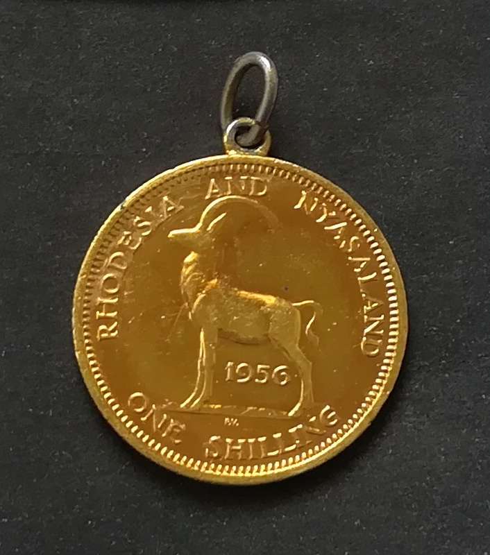 RHODESIA AND NYASALAND 1956 SHILLING *GOLD PLATED* PENDANT