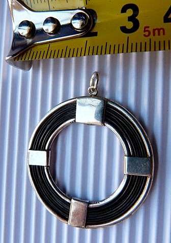 STERLING SILVER AND ELEPHANT HAIR PENDANT. STUNNING PIECE