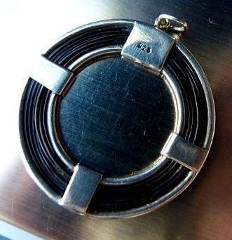 STERLING SILVER AND ELEPHANT HAIR PENDANT. STUNNING PIECE