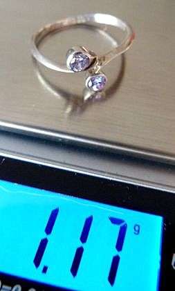 VINTAGE STERLING SILVER RING.  FACETED STONES . UNUSED
