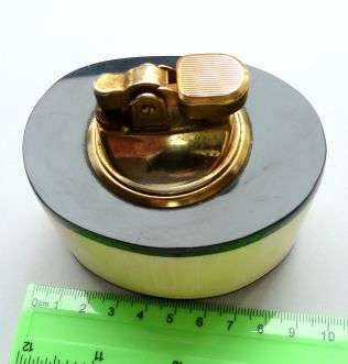 VINTAGE 'PEMGUIN" LIGHTER.  // BONE, HORN AND BRASS