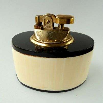 VINTAGE 'PEMGUIN" LIGHTER.  // BONE, HORN AND BRASS