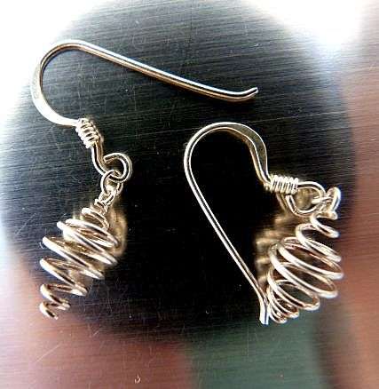 STERLING SILVER VINTAGE EARRINGS .UNUSED
