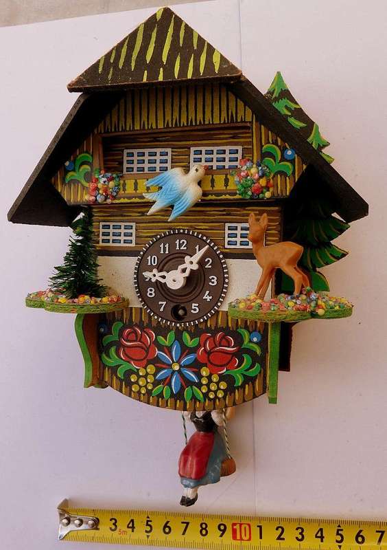 GERMAN WALL CLOCK WITH SWINGING GIRL/ MOVING BIRD