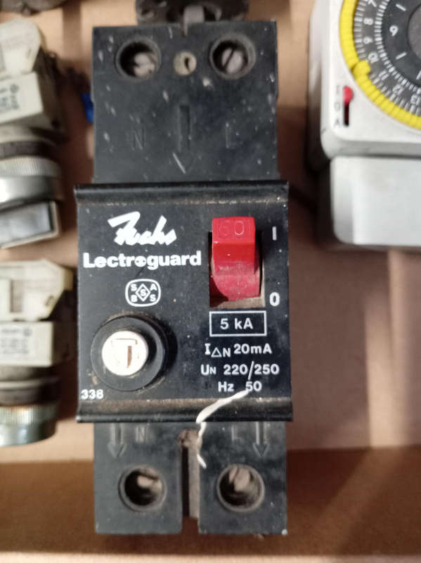 ASSORTED ELECTRICAL SWITCHES AND TIMER AS PER PHOTOS.
