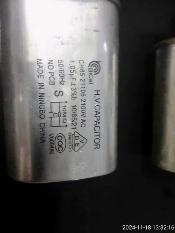 MICROWAVE CAPACITORS X 6 AS PER PHOTOS
