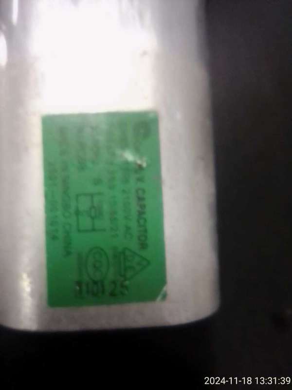 MICROWAVE CAPACITORS X 6 AS PER PHOTOS