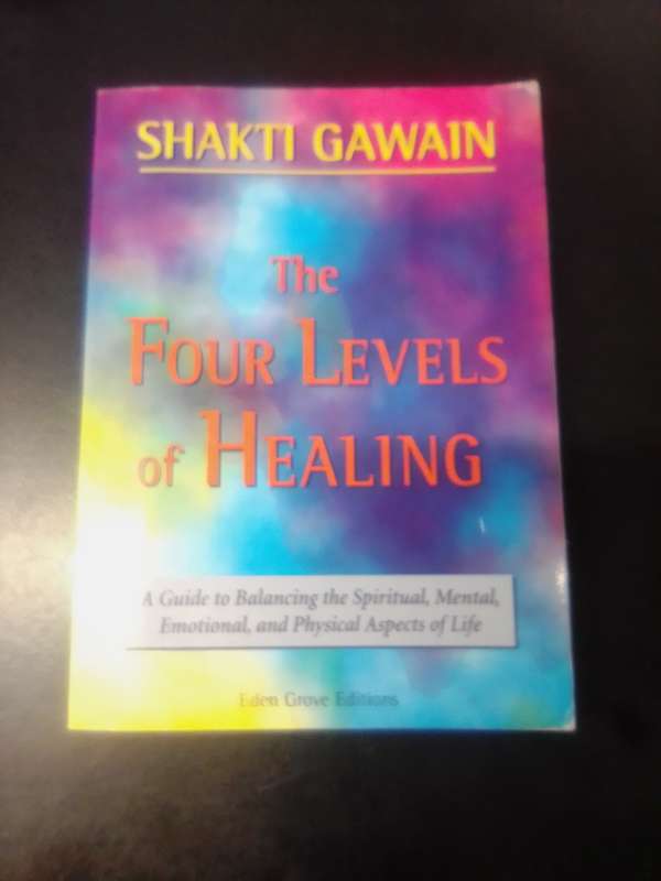 BOOK : " THE FOUR LEVELS OF HEALING " BY SHAKTI GAWAIN.