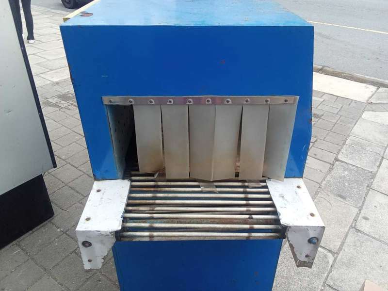 SHRINK TUNNEL FOR PLASTIC WRAPPING.
