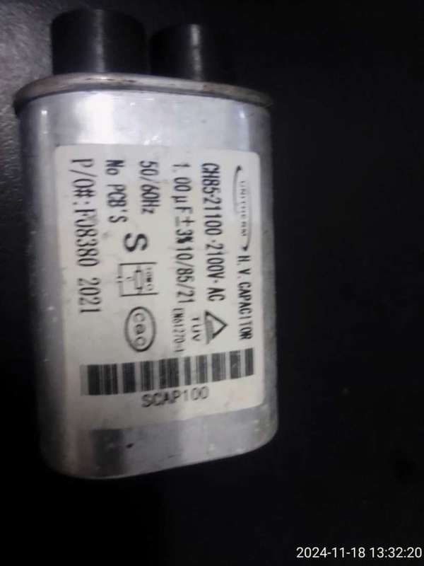 MICROWAVE CAPACITORS X 6 AS PER PHOTOS